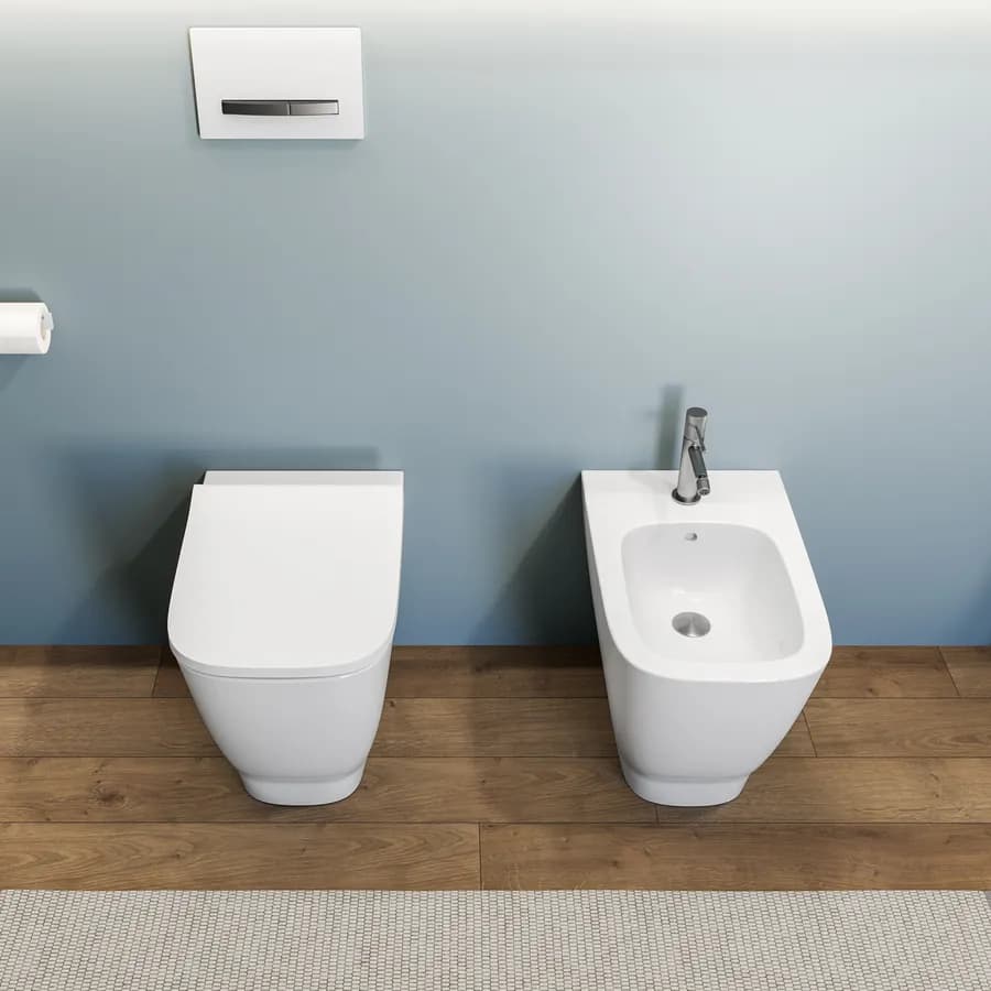 Coppia di sanitari filomuro vaso rimless e bidet bianco - Smyle square di Geberit