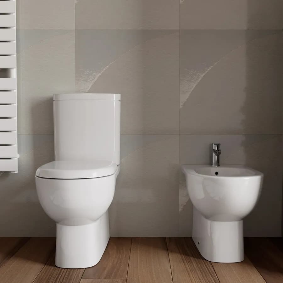 Coppia di sanitari vaso monoblocco e bidet con sedile soft-close in ceramica - Ligor