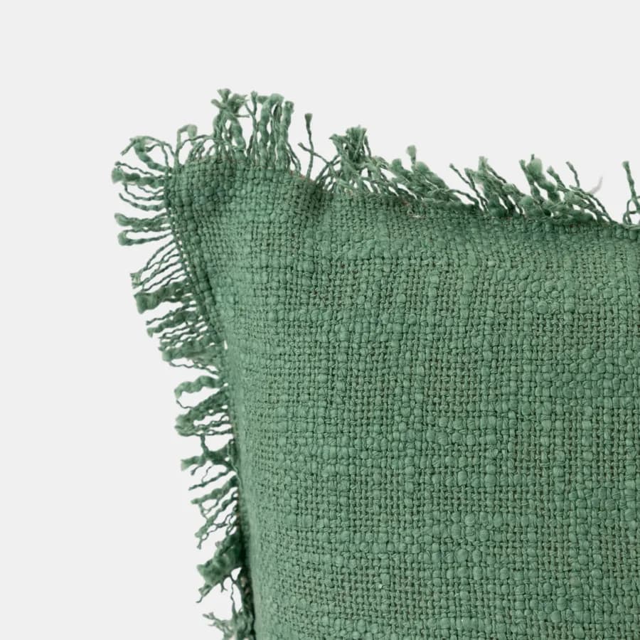 Cuscino sfoderabile 45x45 verde in bouclé con frange