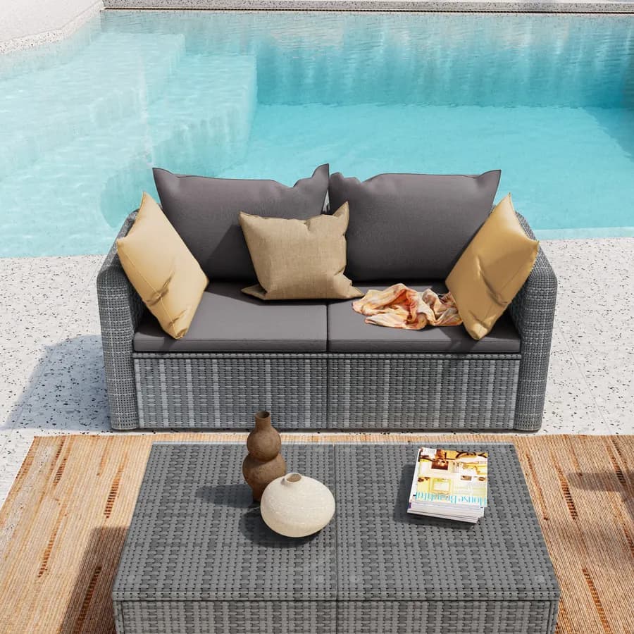 Divano da giardino 2 posti in polyrattan grigio con cuscini - Horizon