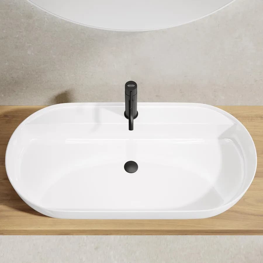 Lavabo ovale da 80 cm in ceramica bianco lucido da appoggio monoforo