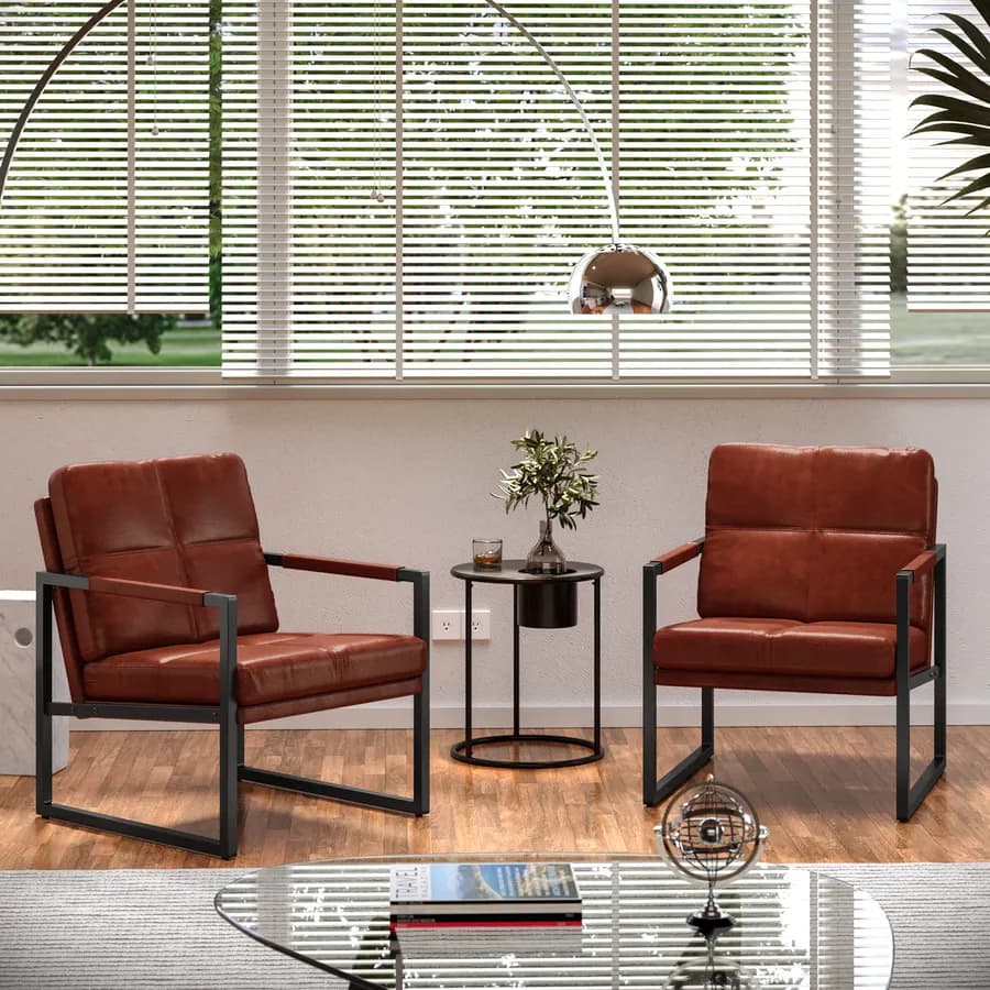 Poltrona in similpelle cognac con struttura in metallo nero - Dudley