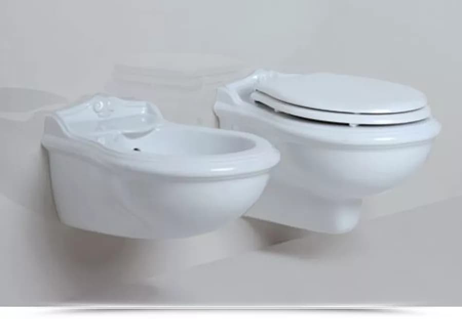 Sanitari sospesi in ceramica serie JUBILAEUM di Azzurra con sedile copri wc design classico