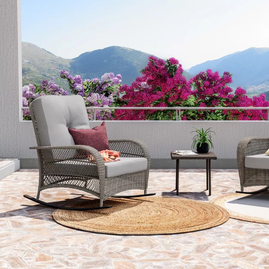 Sedia a dondolo in polyrattan grigio con cuscino grigio - Irmas