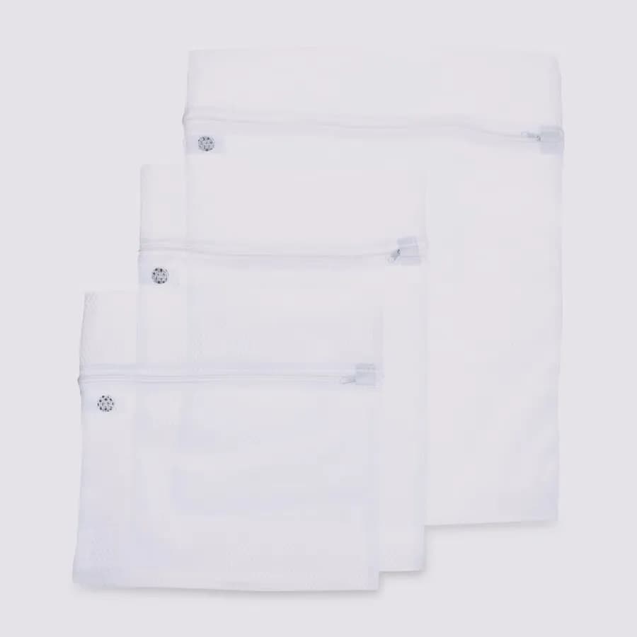 Set 3 sacchetti per lavatrice in tessuto bianco con zip