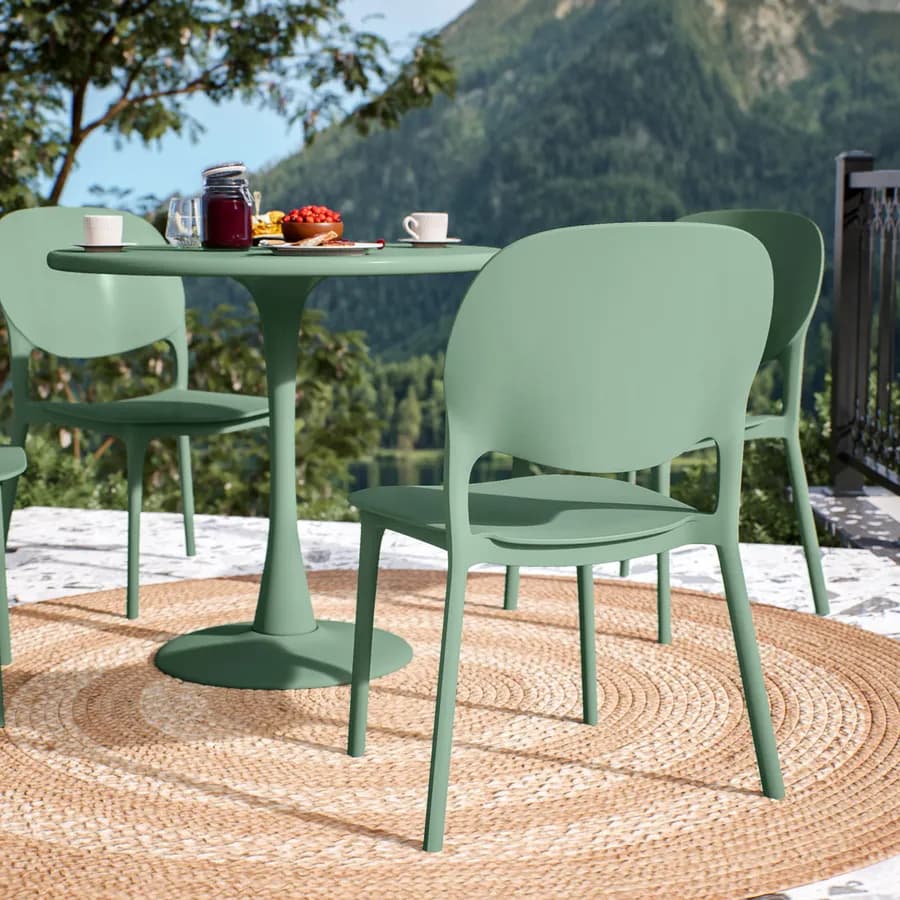 Set pranzo con tavolo rotondo 80 cm e 4 sedie impilabili in polipropilene verde giada - Tulipano