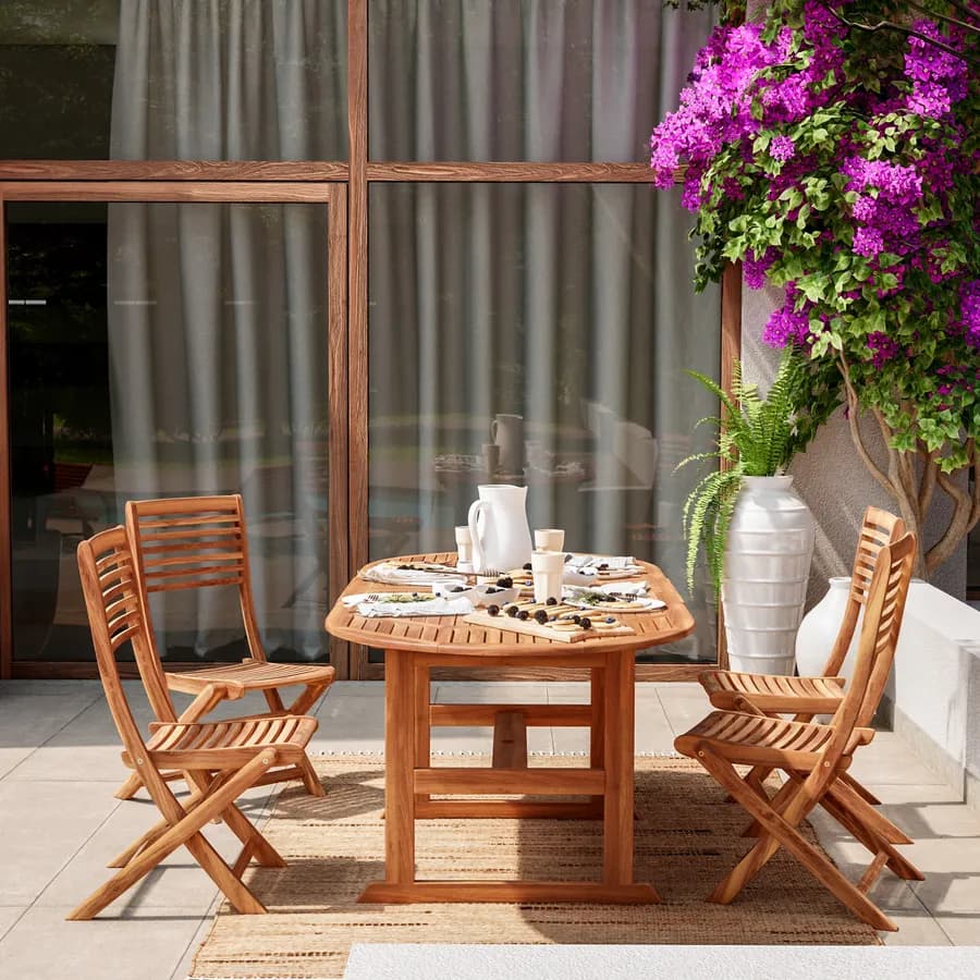 Set pranzo con tavolo allungabile 150/200x100 cm e 4 sedie pieghevoli in legno acacia - Paja