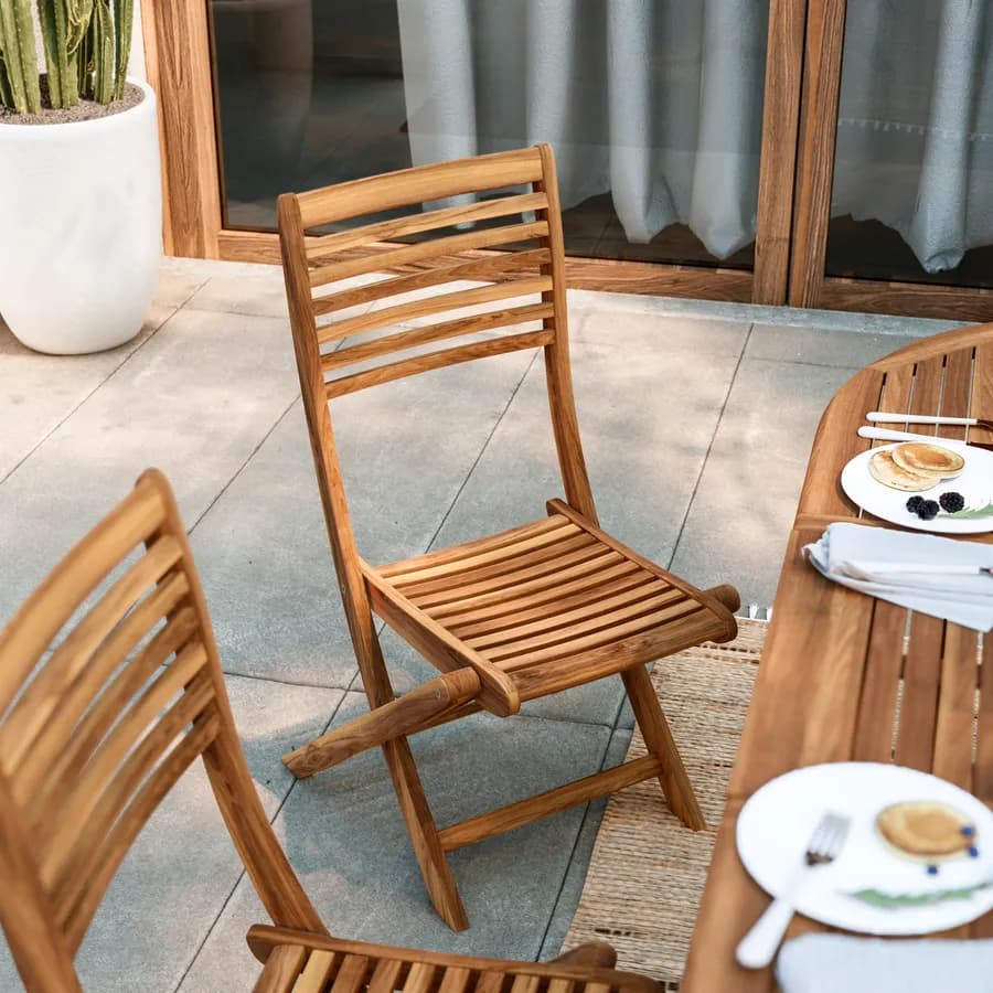Set pranzo con tavolo allungabile 150/200x100 cm e 4 sedie pieghevoli in legno acacia - Paja