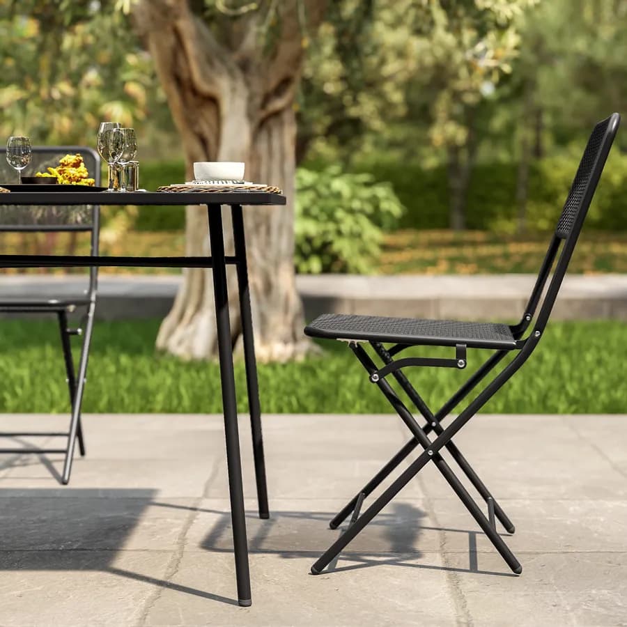 Set pranzo con tavolo 150x80 cm e 4 sedie pieghevoli in acciaio nero - Faber