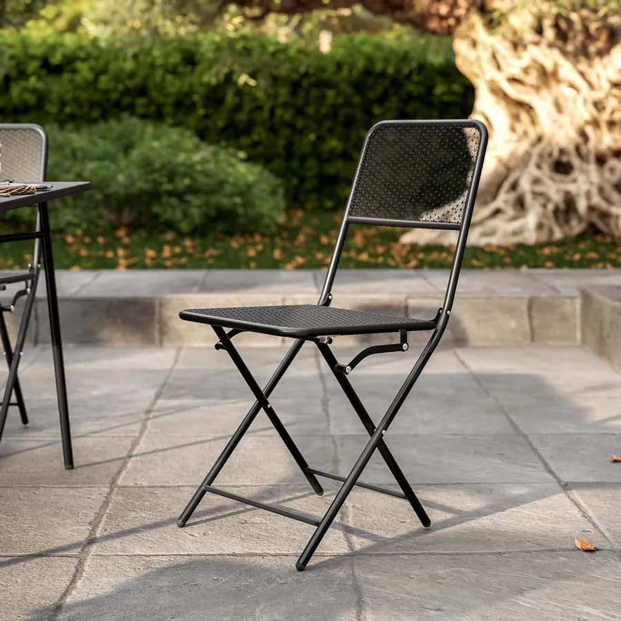 Set pranzo con tavolo 150x80 cm e 4 sedie pieghevoli in acciaio nero - Faber