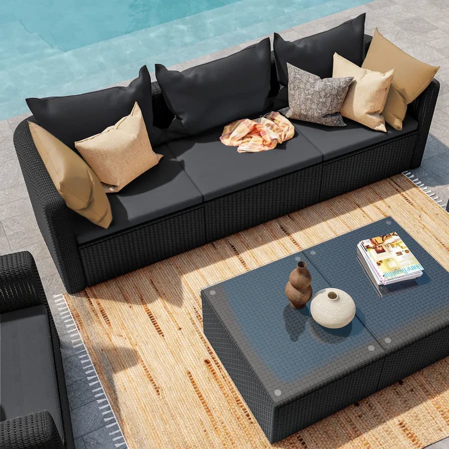 Set relax con divano 3 posti 2 poltrone e tavolino in polyrattan nero con cuscini - Horizon