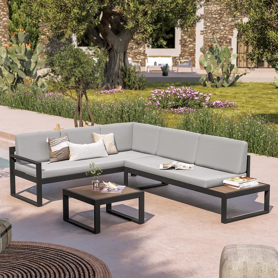 Set relax con divano angolare e tavolino in alluminio antracite con cuscini grigi - Kavos