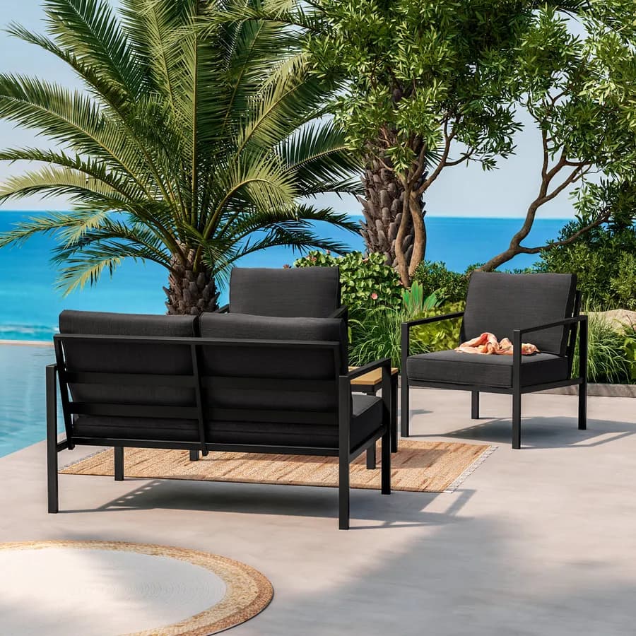 Set relax con divano due poltrone e tavolino in acciaio e cuscini nero - Evelyn