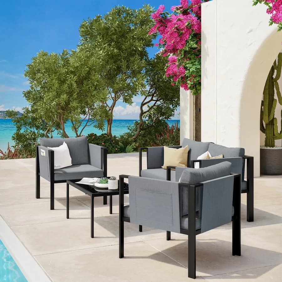 Set relax divano 2 poltrone e tavolino in acciaio nero con cuscini grigio scuro - Tirrena
