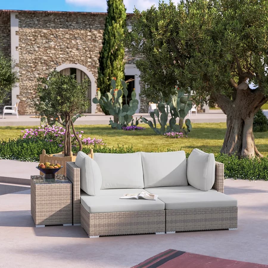 Set relax modulare con divano 2 pouf e tavolino top in vetro in polyrattan beige - Tropico