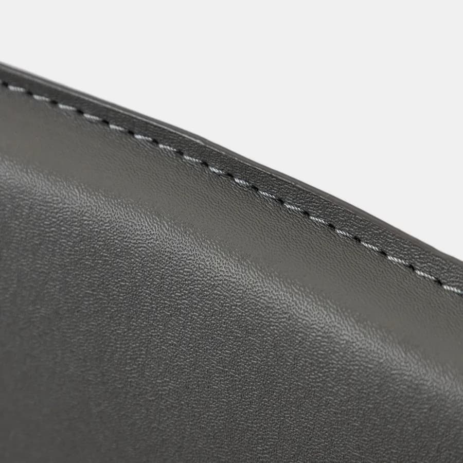 Sgabello in similpelle grigio scuro con poggiapiedi - Manfredi
