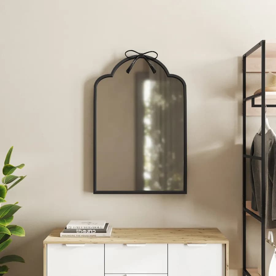Specchio da parete 55x85h cm con cornice in metallo nero con dettaglio fiocco - Lesil