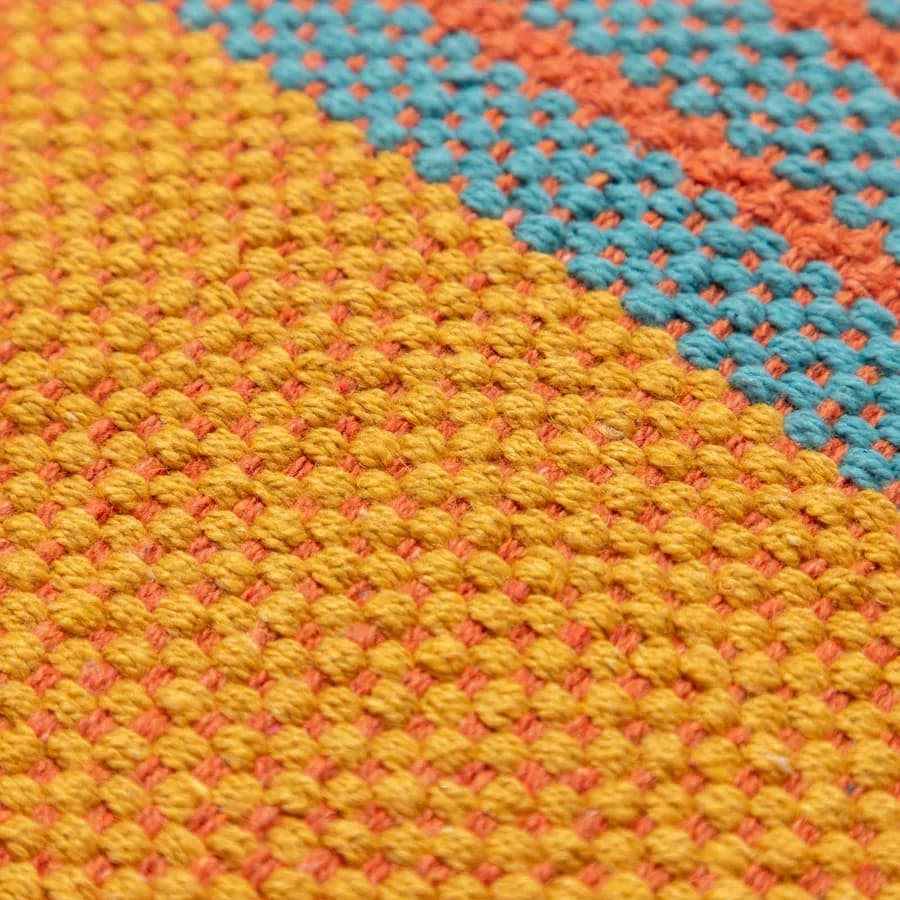 Tappeto 120x180 cm in cotone senape con frange