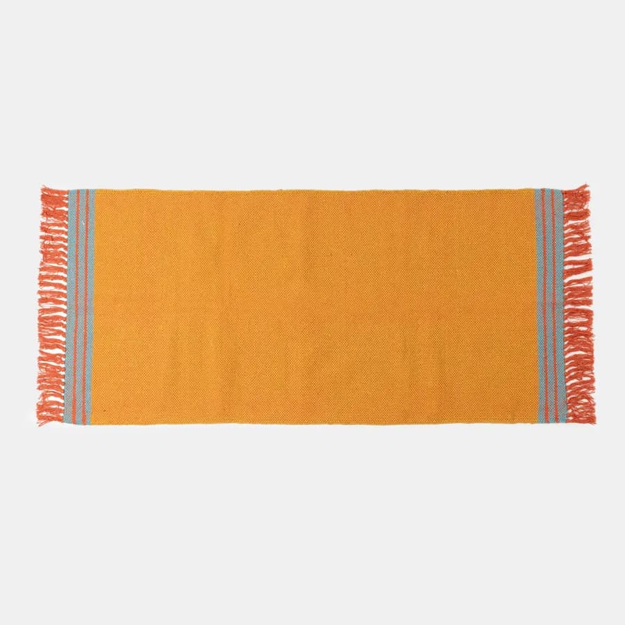 Tappeto 70x140 cm in cotone senape con frange