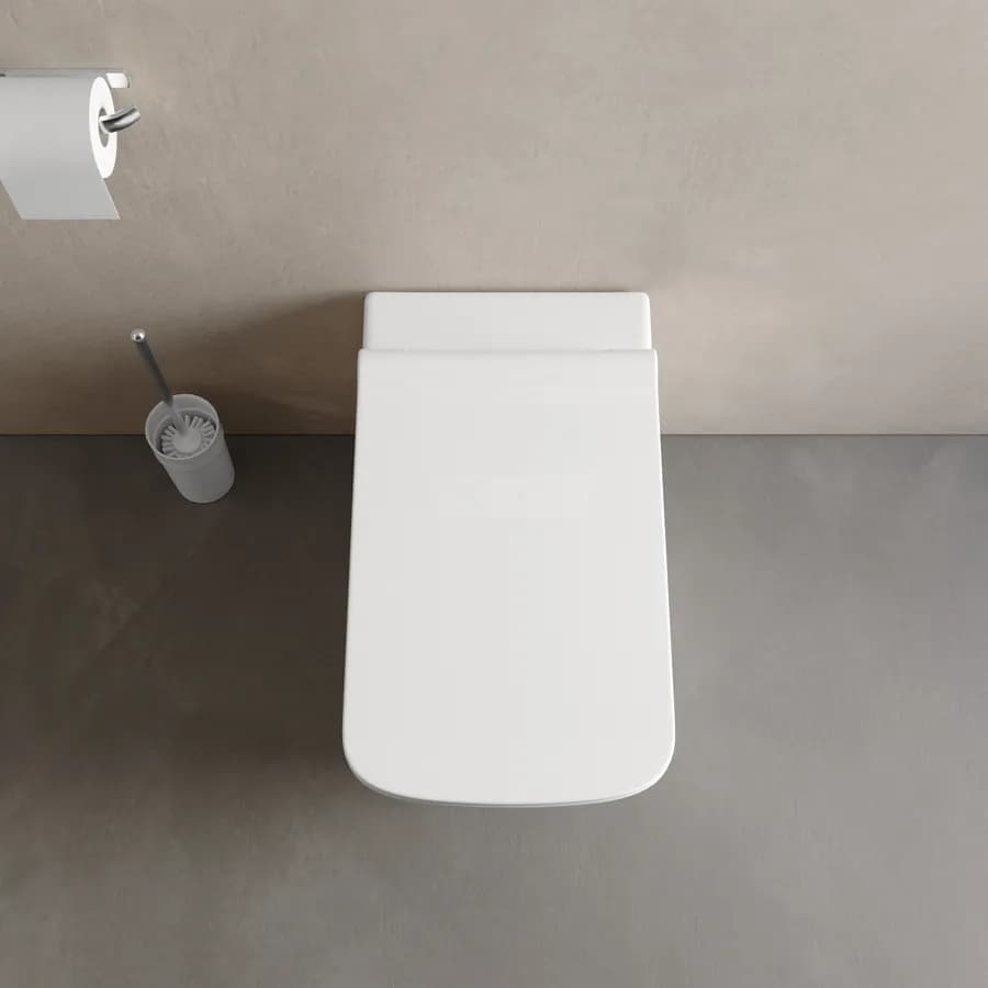 Vaso filomuro con sedile soft- close in ceramica bianca - Tidix