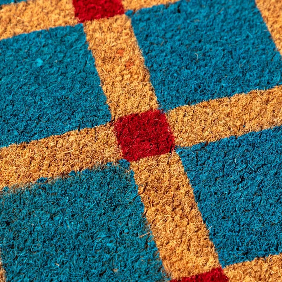 Zerbino blu petrolio 45x75 cm in coir naturale con disegno geometrico