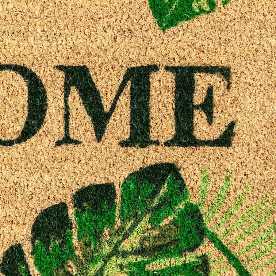 Zerbino Welcome 45x75 cm in coir beige con stampa floreale