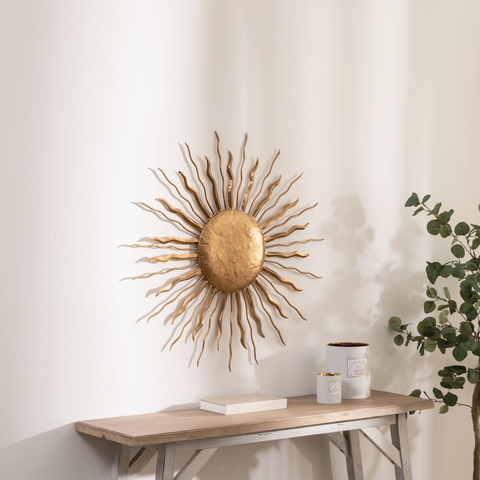Decorazione da parete rotonda 80 cm in acciaio oro martellato