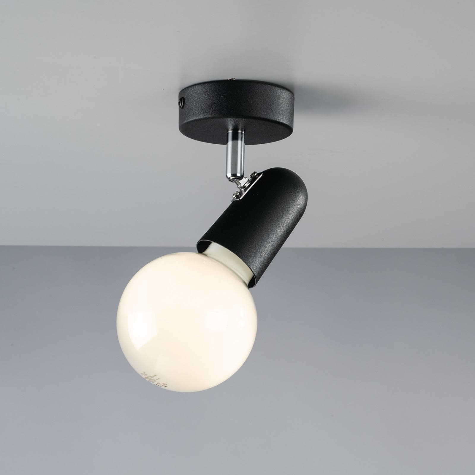 Lampada 1 spot tondo orientabile da interno 8x12x9,6 cm in metallo nero