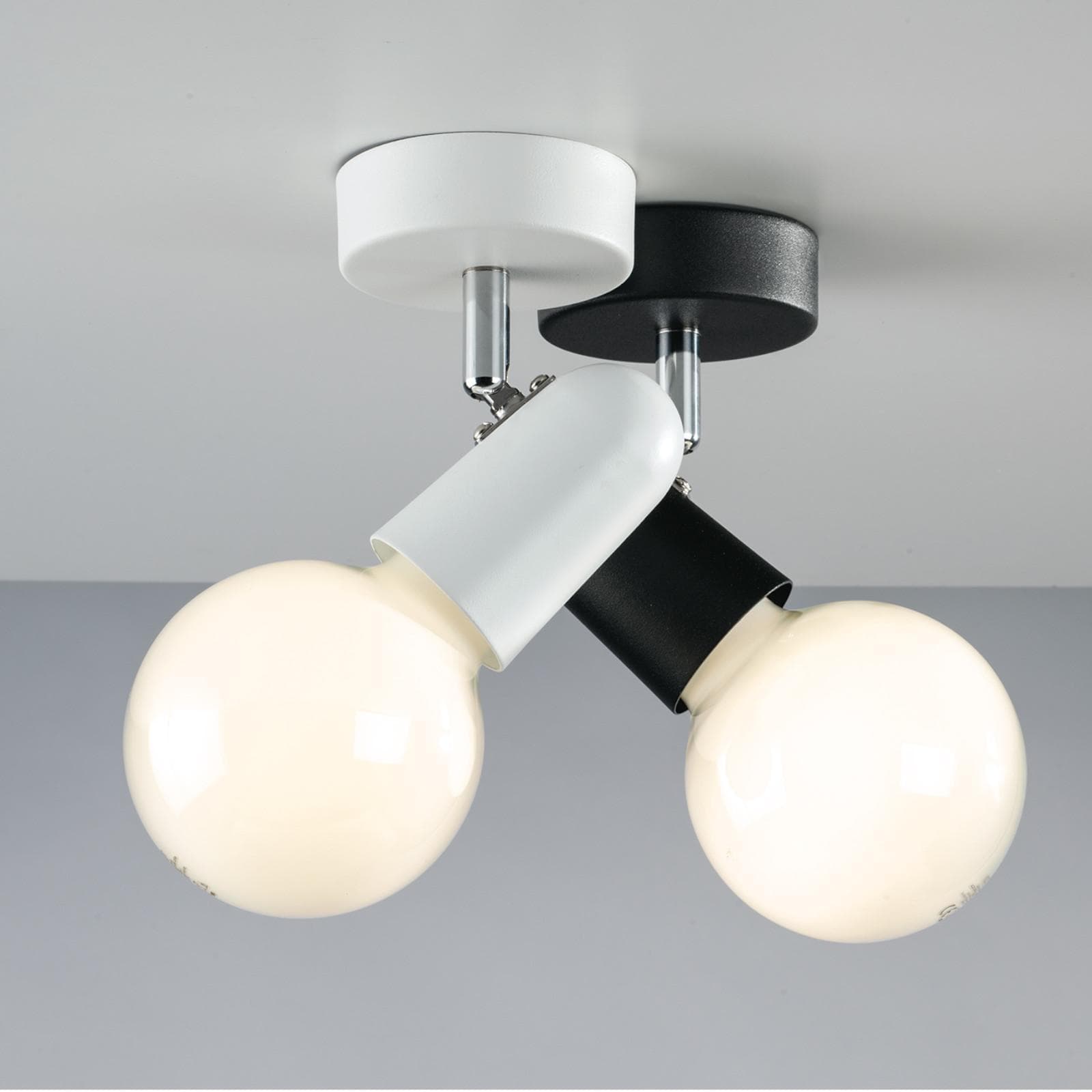 Lampada 1 spot tondo orientabile da interno 8x12x9,6 cm in metallo nero