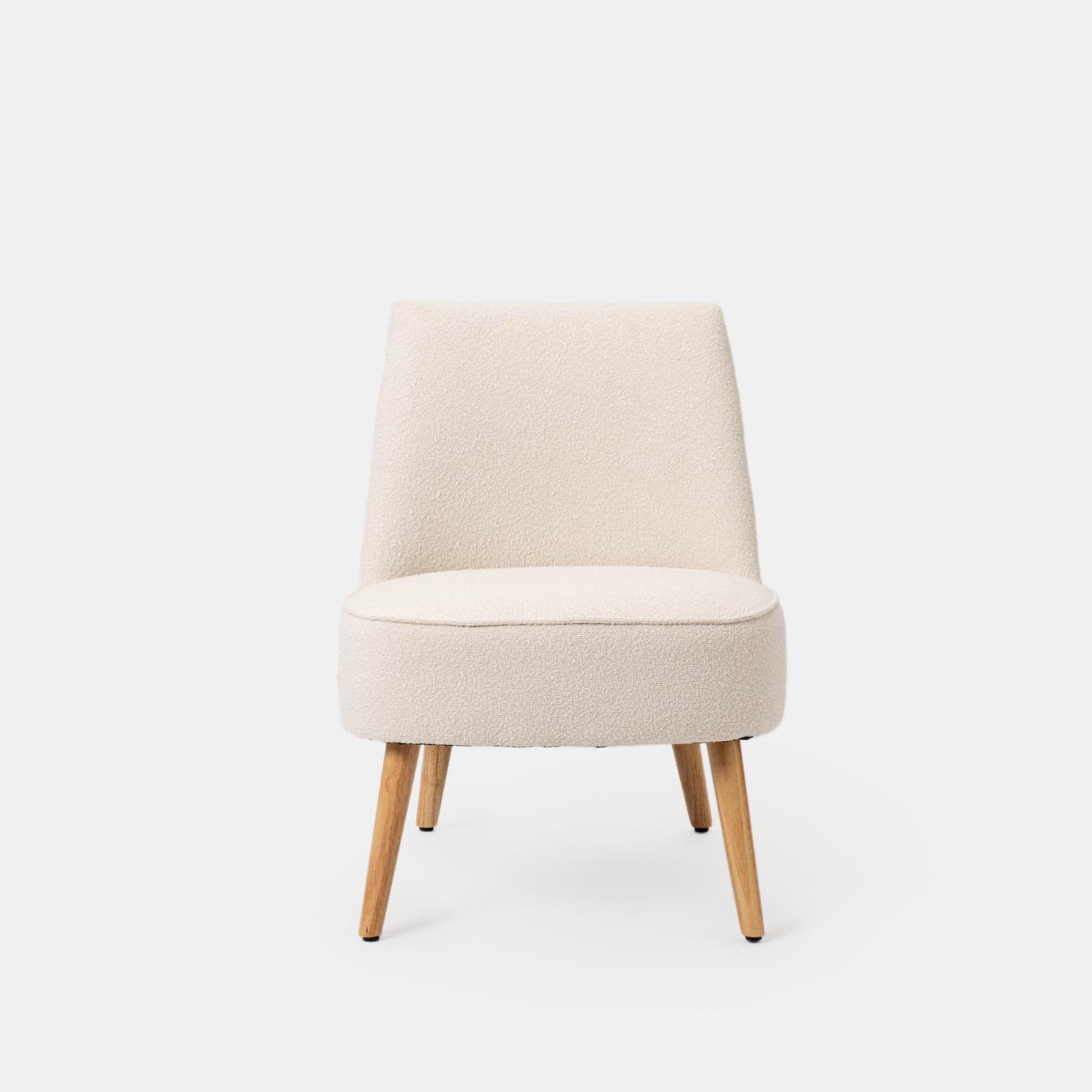 Poltrona in bouclé crema con gambe in legno - Dirla