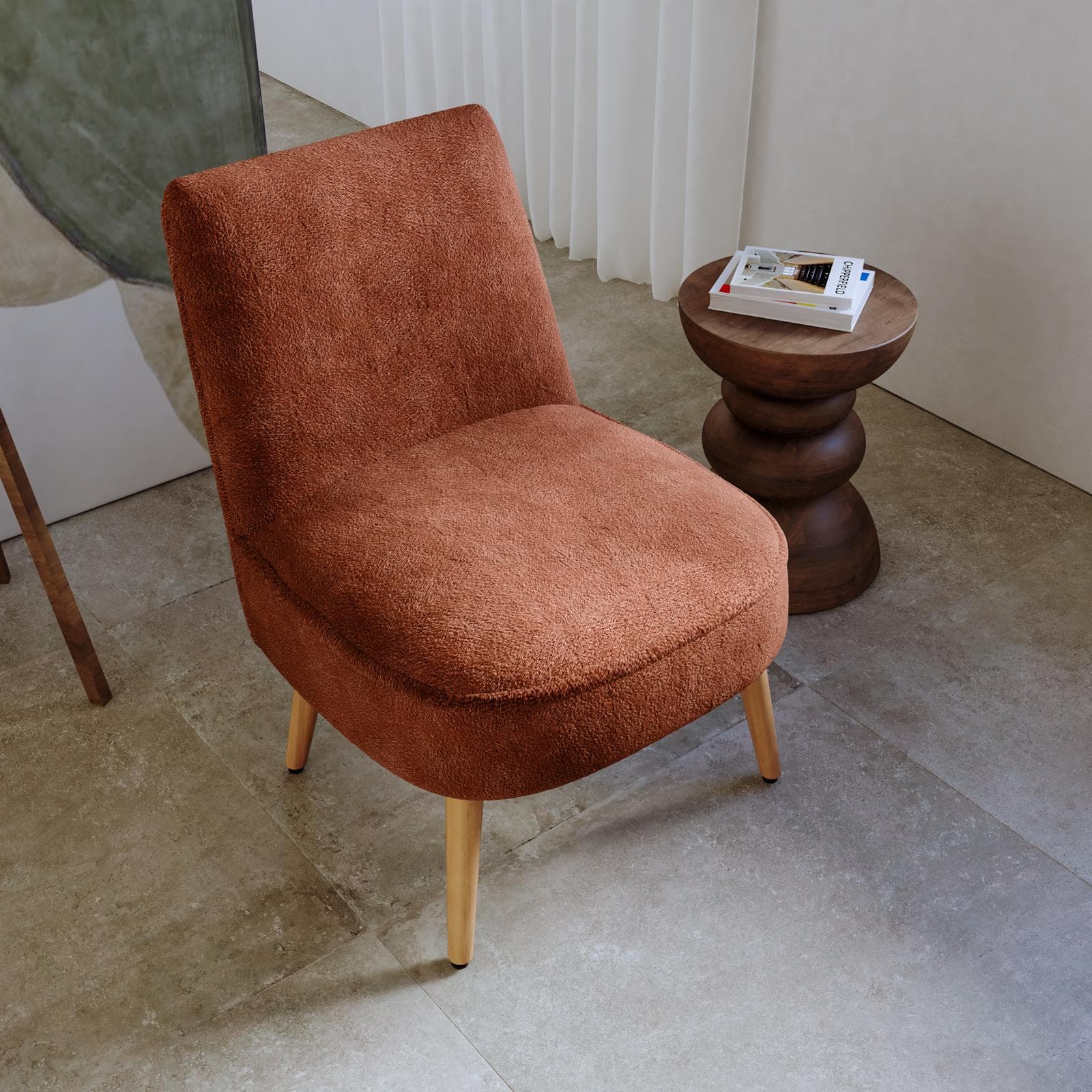 Poltrona in bouclé terracotta con gambe in legno - Dirla