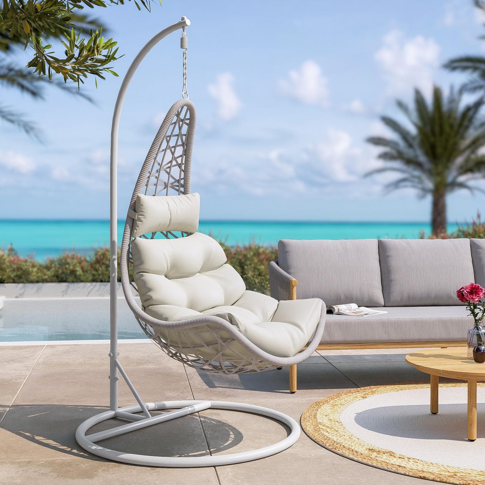 Poltrona sospesa in polyrattan bianco con cuscini panna - Duna
