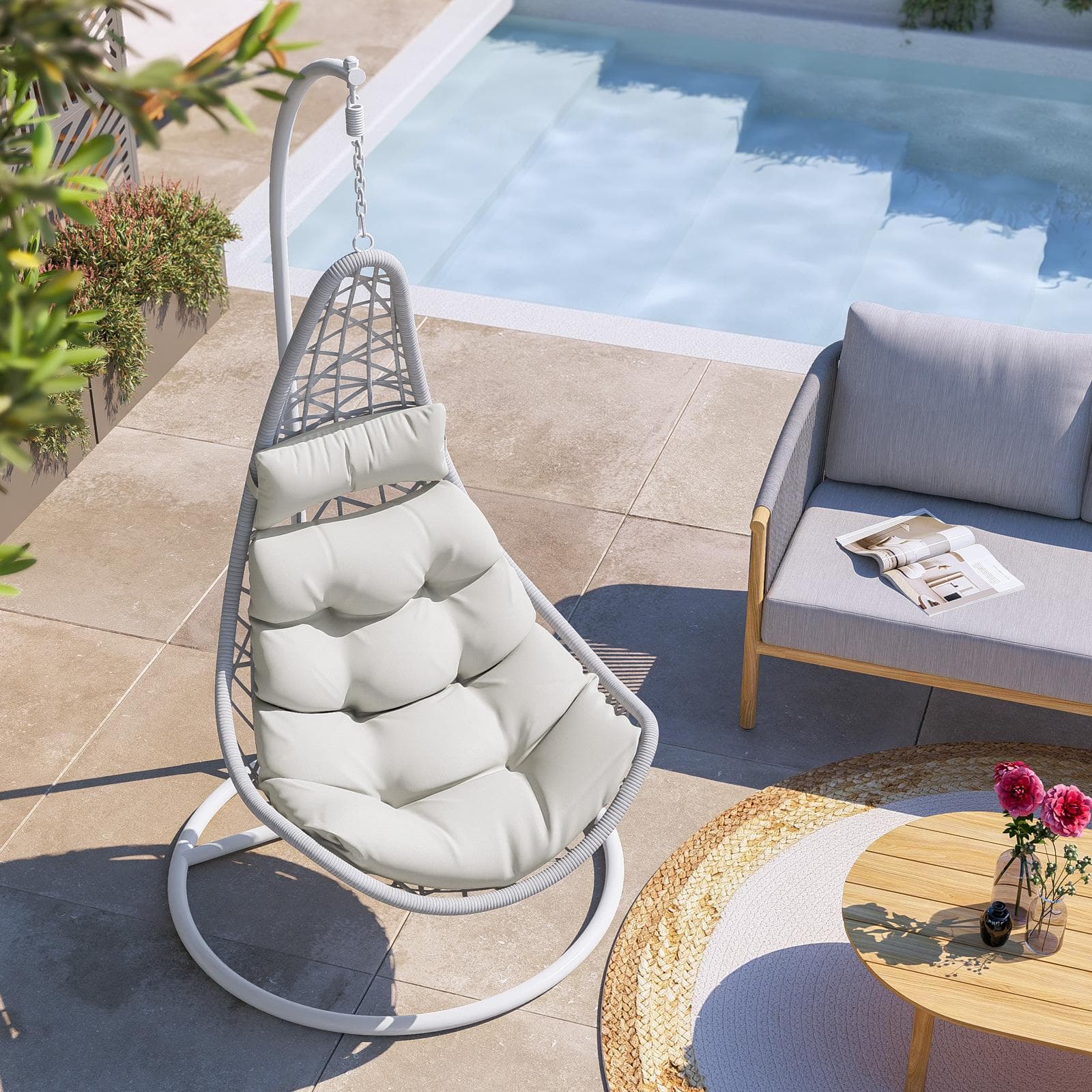 Poltrona sospesa in polyrattan bianco con cuscini panna - Duna
