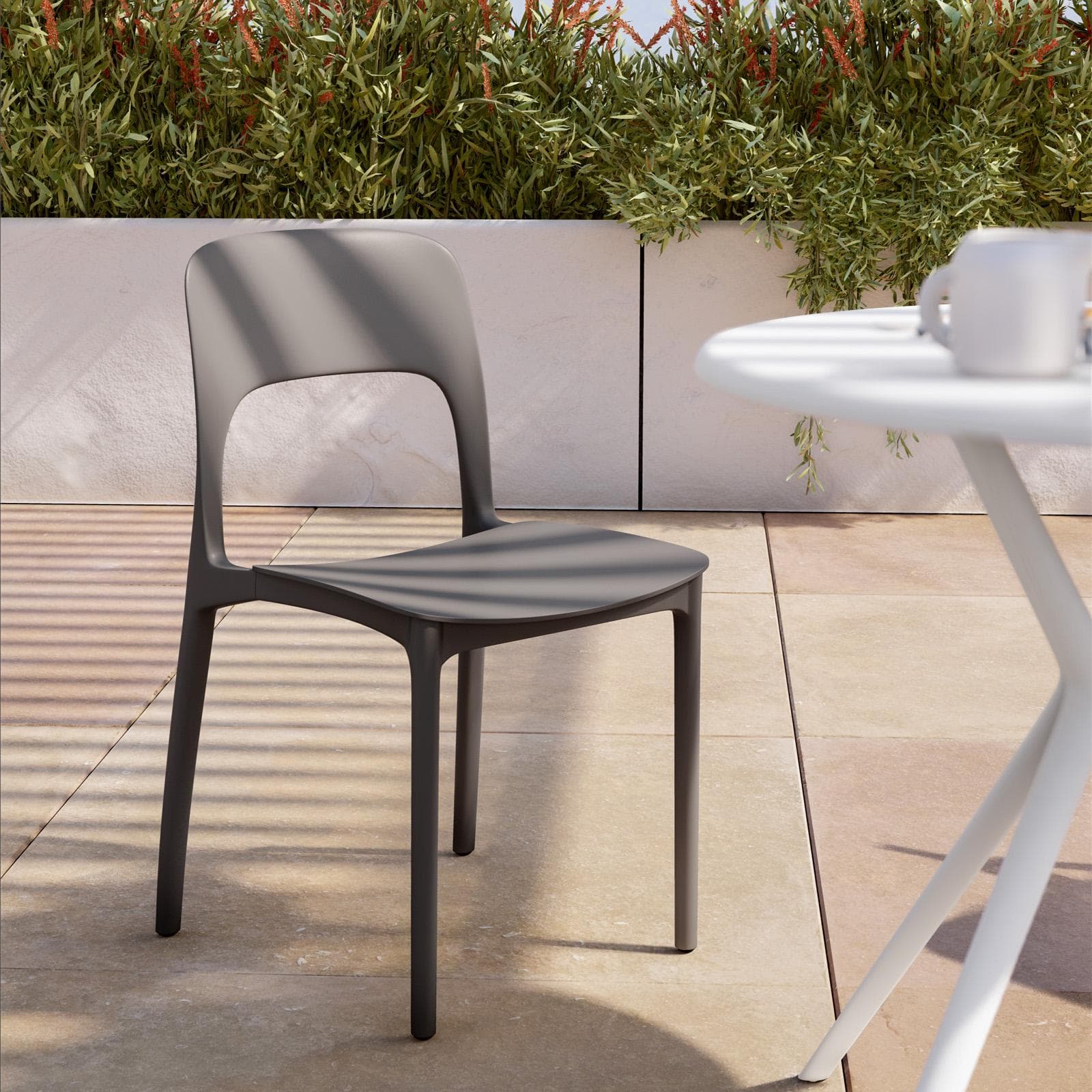 Sedia da giardino impilabile in polipropilene grigio - Arabella