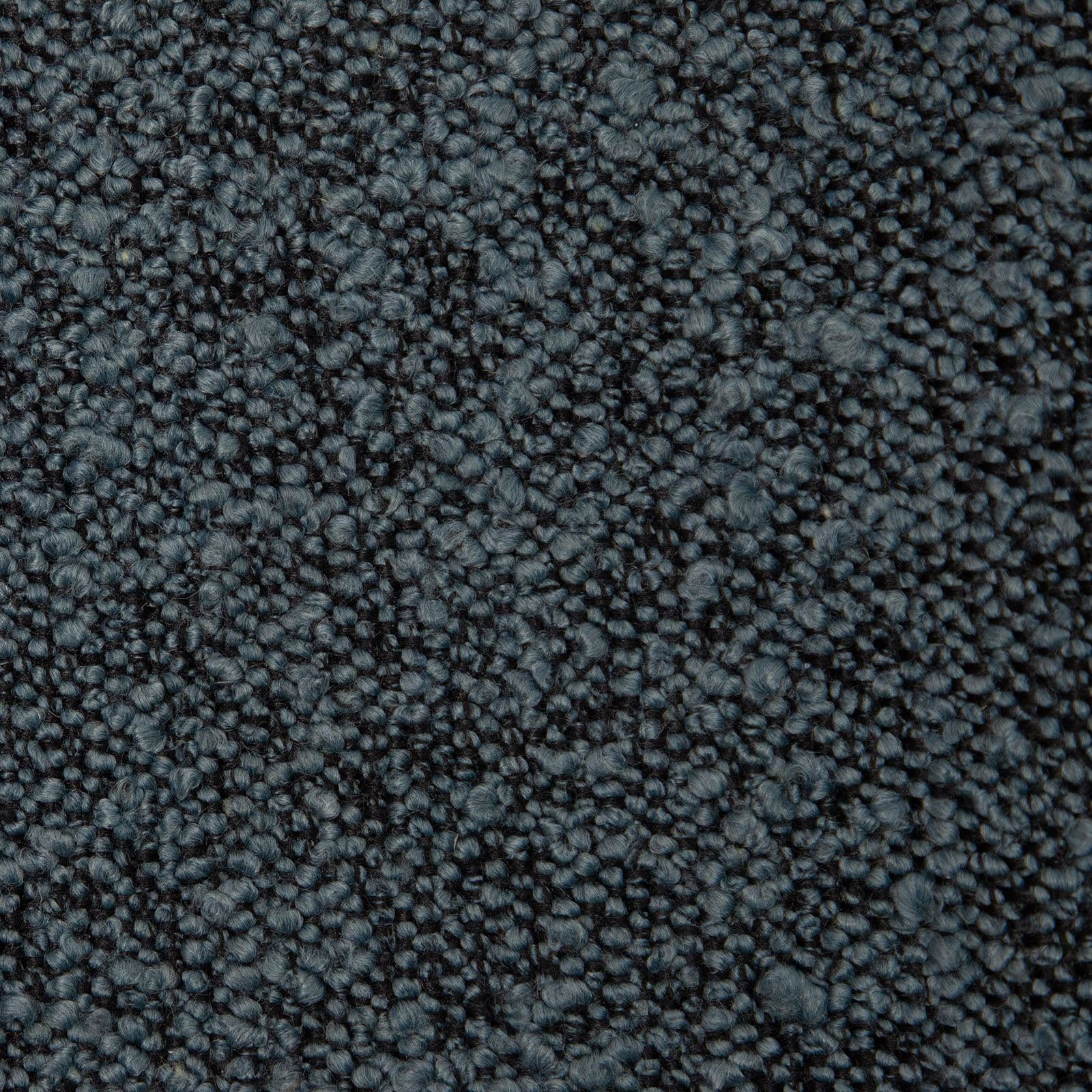 Poltrona in tessuto bouclé blu scuro con schienale avvolgente e gambe in metallo nero - Rosabel