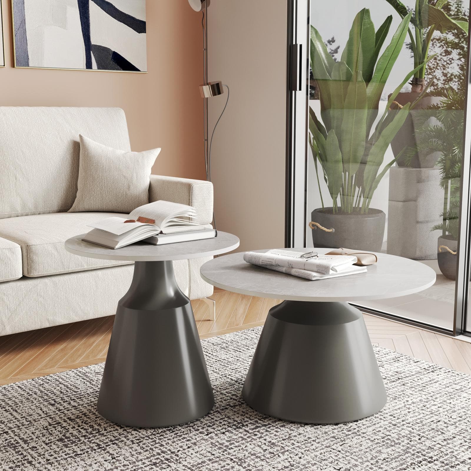 Set 2 tavolini tondi 50 e 70 cm in ceramica grigio chiaro effetto marmo e base in metallo grigio - Mikado