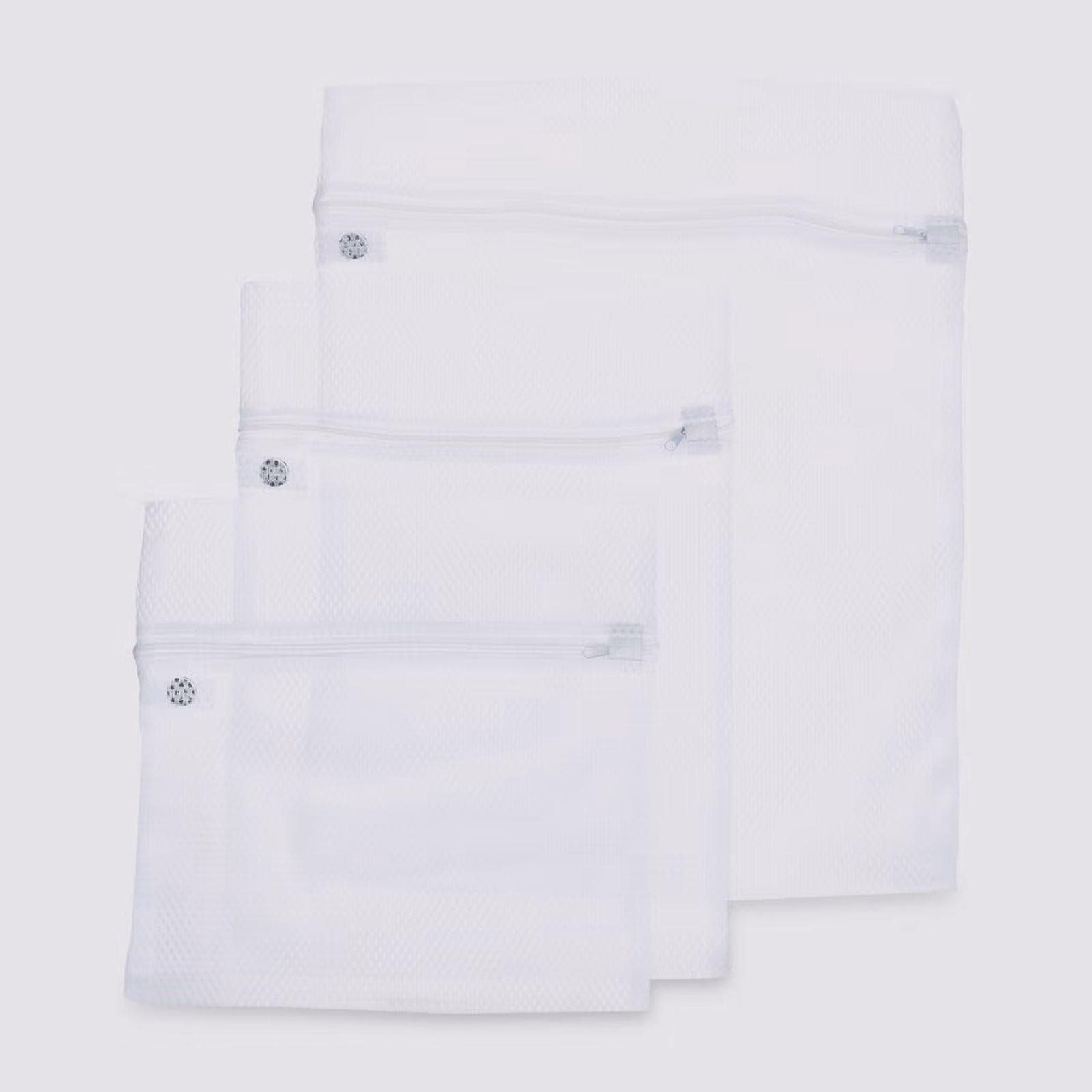 Set 3 sacchetti per lavatrice in tessuto bianco con zip