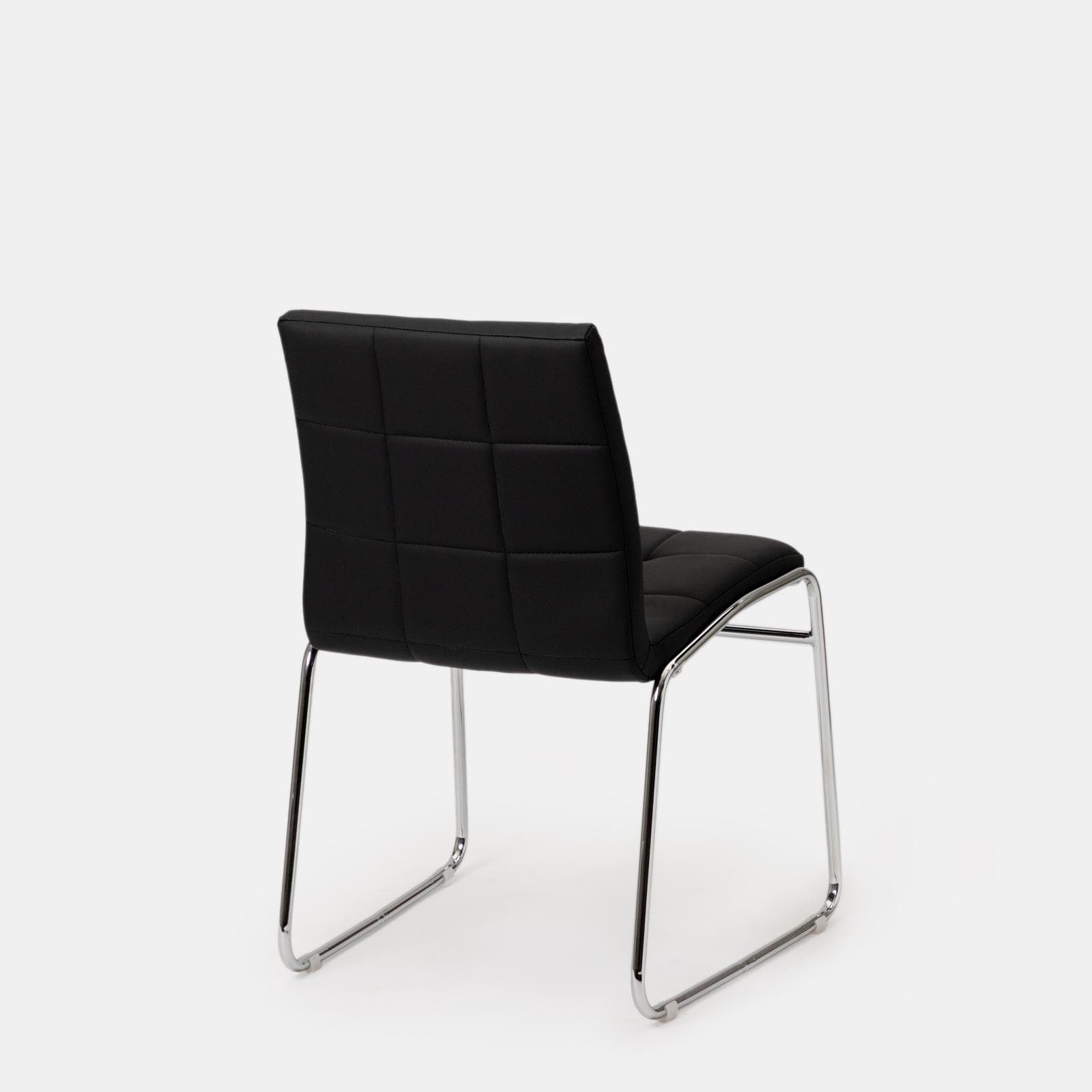 Set 4 sedie in similpelle nera con gambe a slitta cromo - Dilez