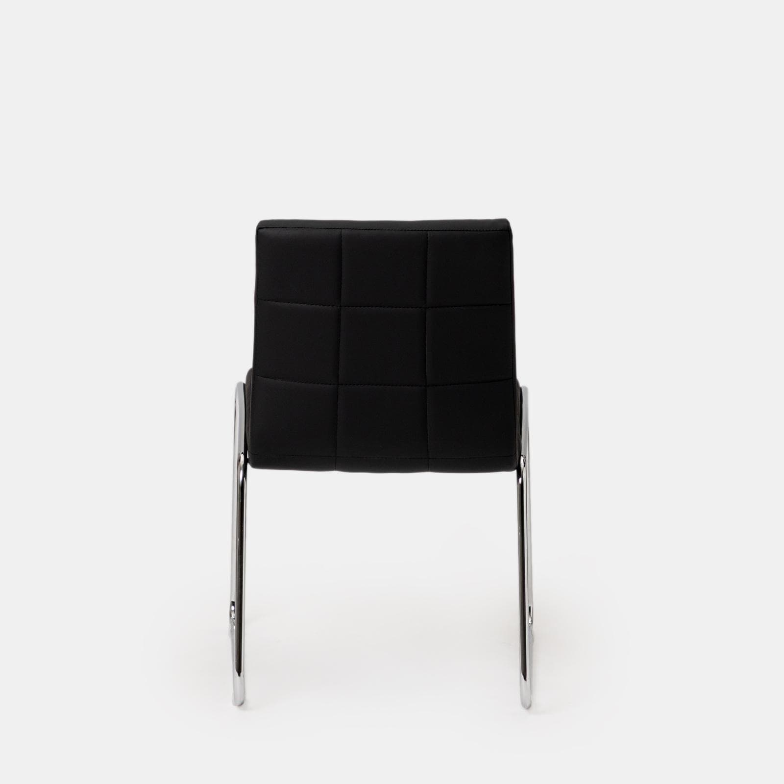 Set 4 sedie in similpelle nera con gambe a slitta cromo - Dilez