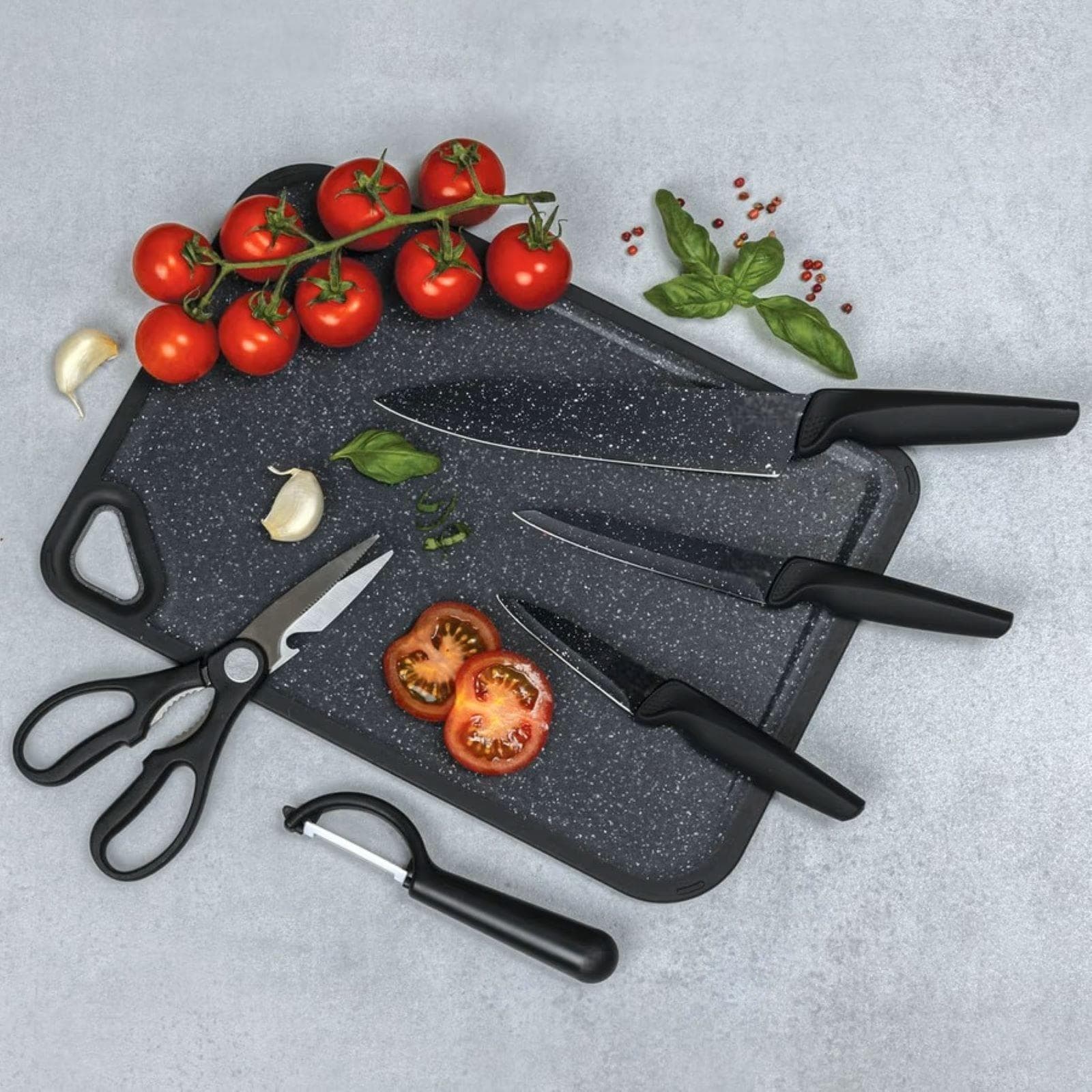 Set 6 utensili per la cucina in acciaio effetto pietra nero e polipropielene - Yasmira