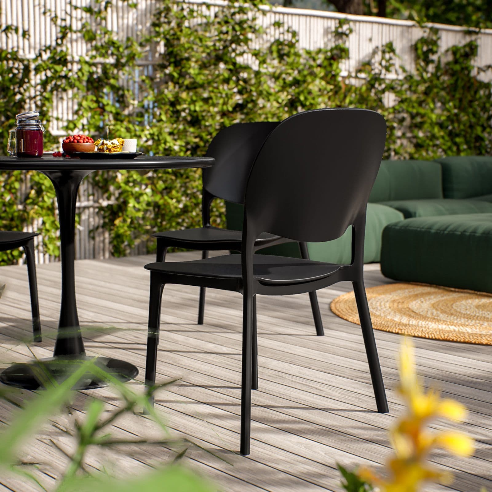 Set pranzo tavolo rotondo 100 cm e 4 sedie impilabili in polipropilene nero - Tulipano