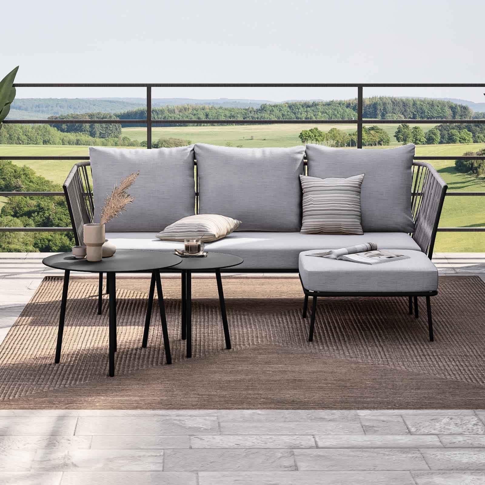 Set relax divano pouf e 2 tavolini in acciaio e polyrattan grigio - Klaus