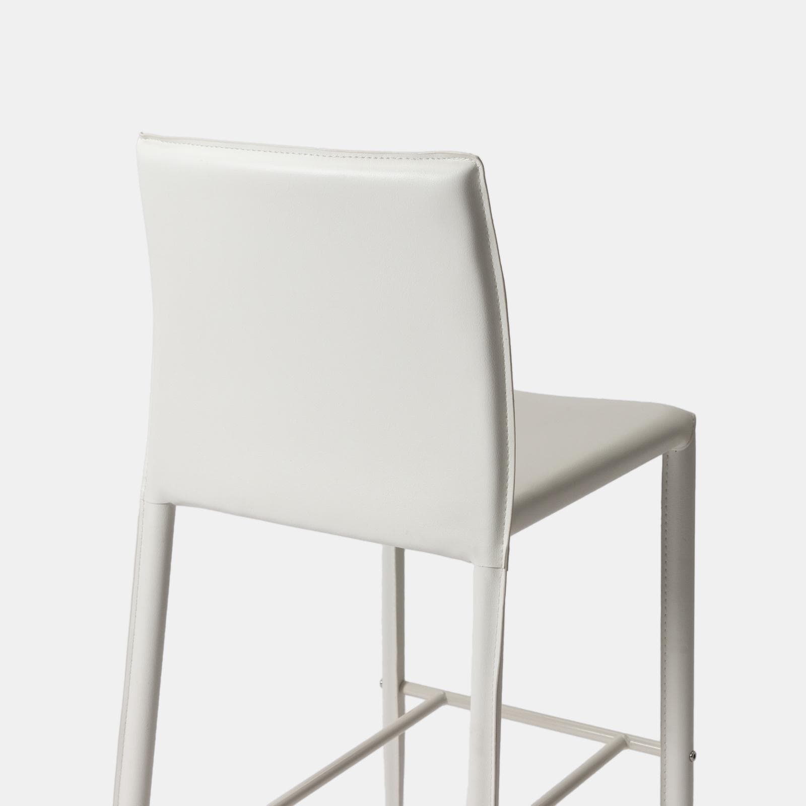 Sgabello in similpelle bianco con poggiapiedi - Manfredi