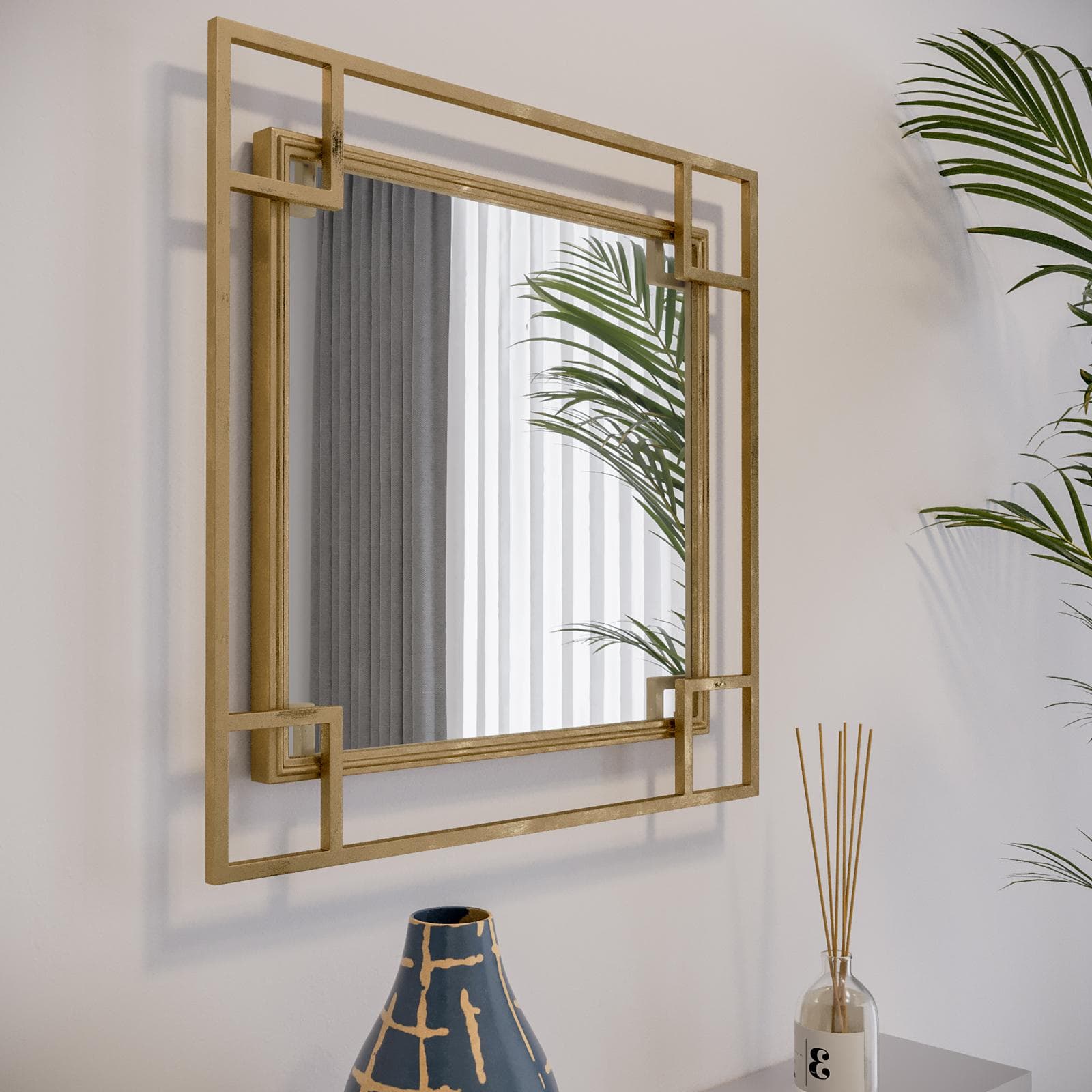 Specchio da parete 55x55 cm con cornice in metallo oro - Zarren
