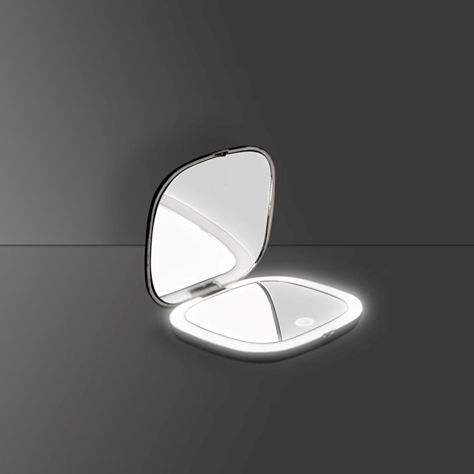 Specchio LED da trucco tascabile nero con lato ingranditore e comando touch