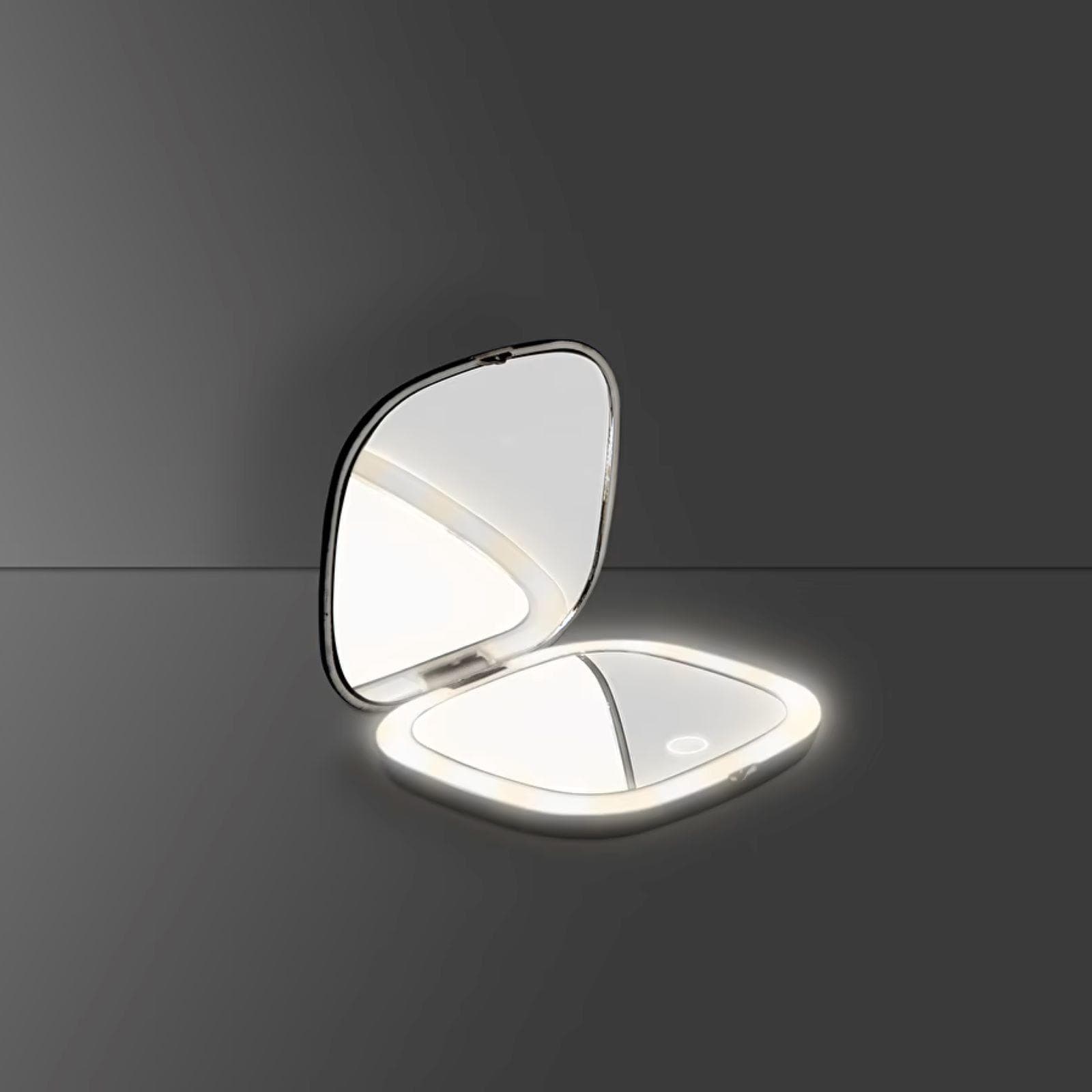 Specchio LED da trucco tascabile nero con lato ingranditore e comando touch