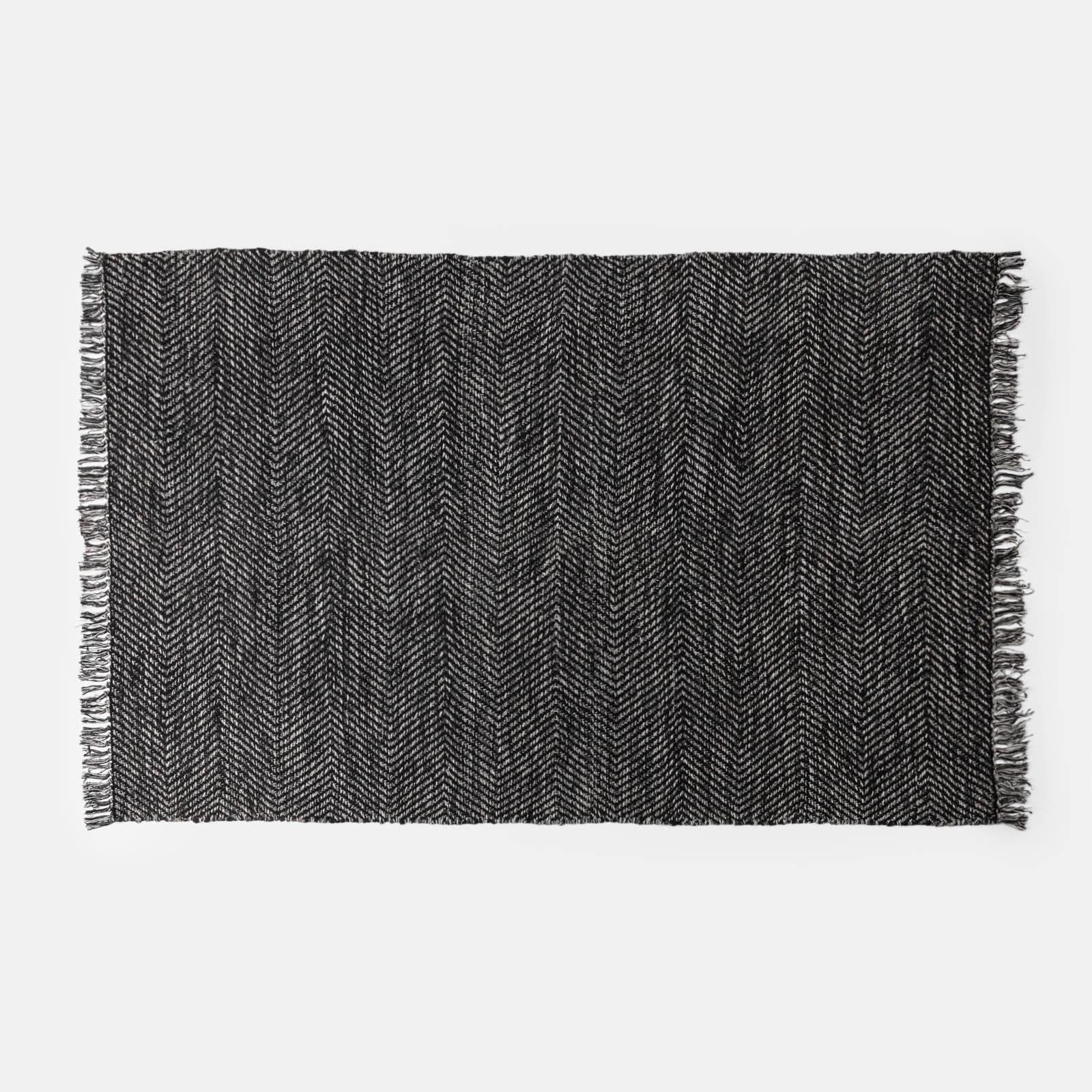 Tappeto 180x120 cm in cotone nero con effetto a spina di pesce