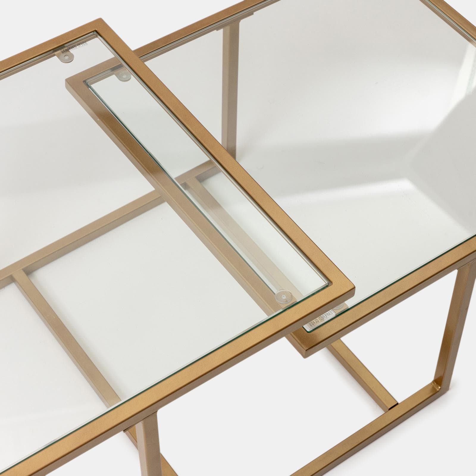 Tavolino 110x59 cm con 2 top in vetro e struttura in metallo finitura oro - Meyer