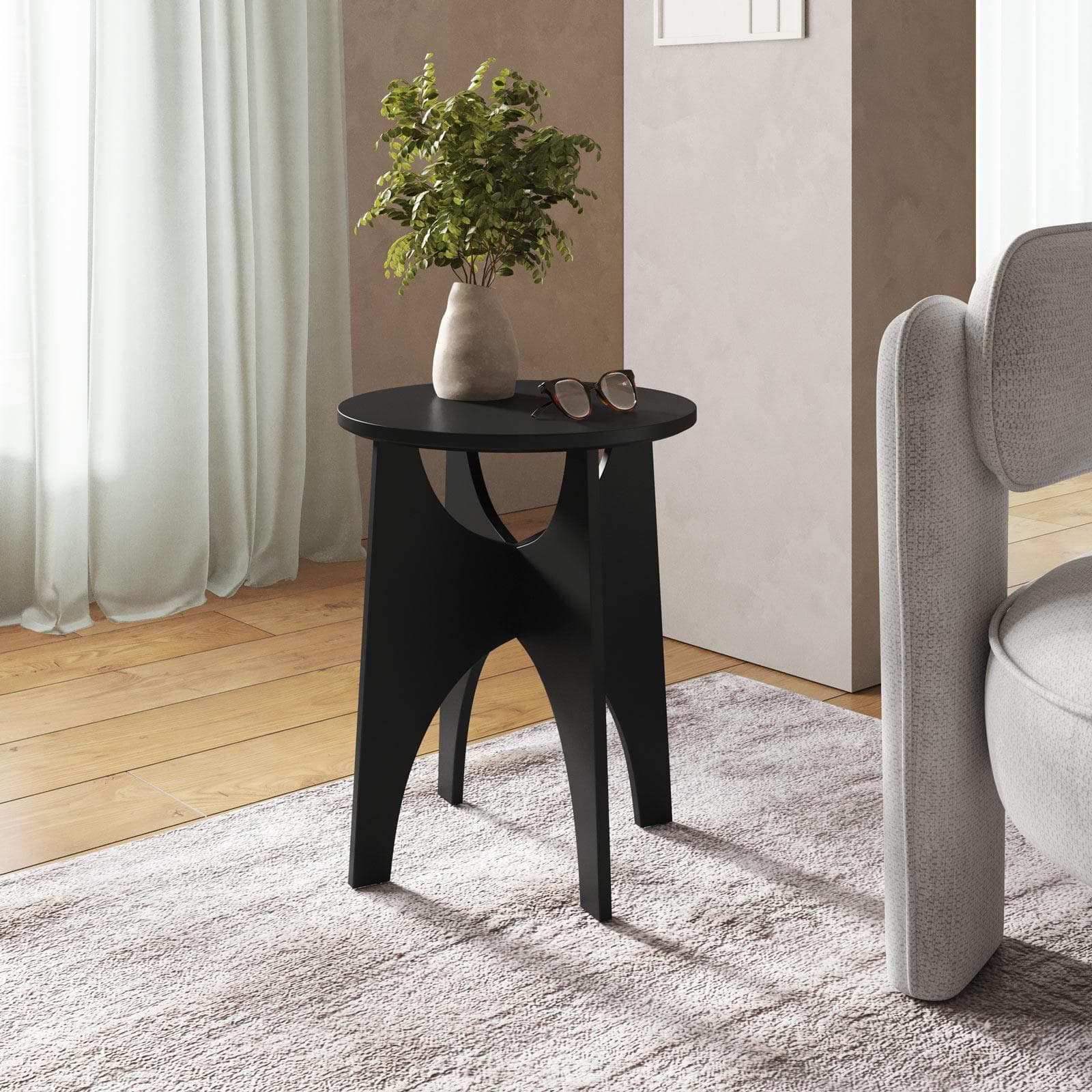 Tavolino rotondo 40 cm nero con design curvo - Toby