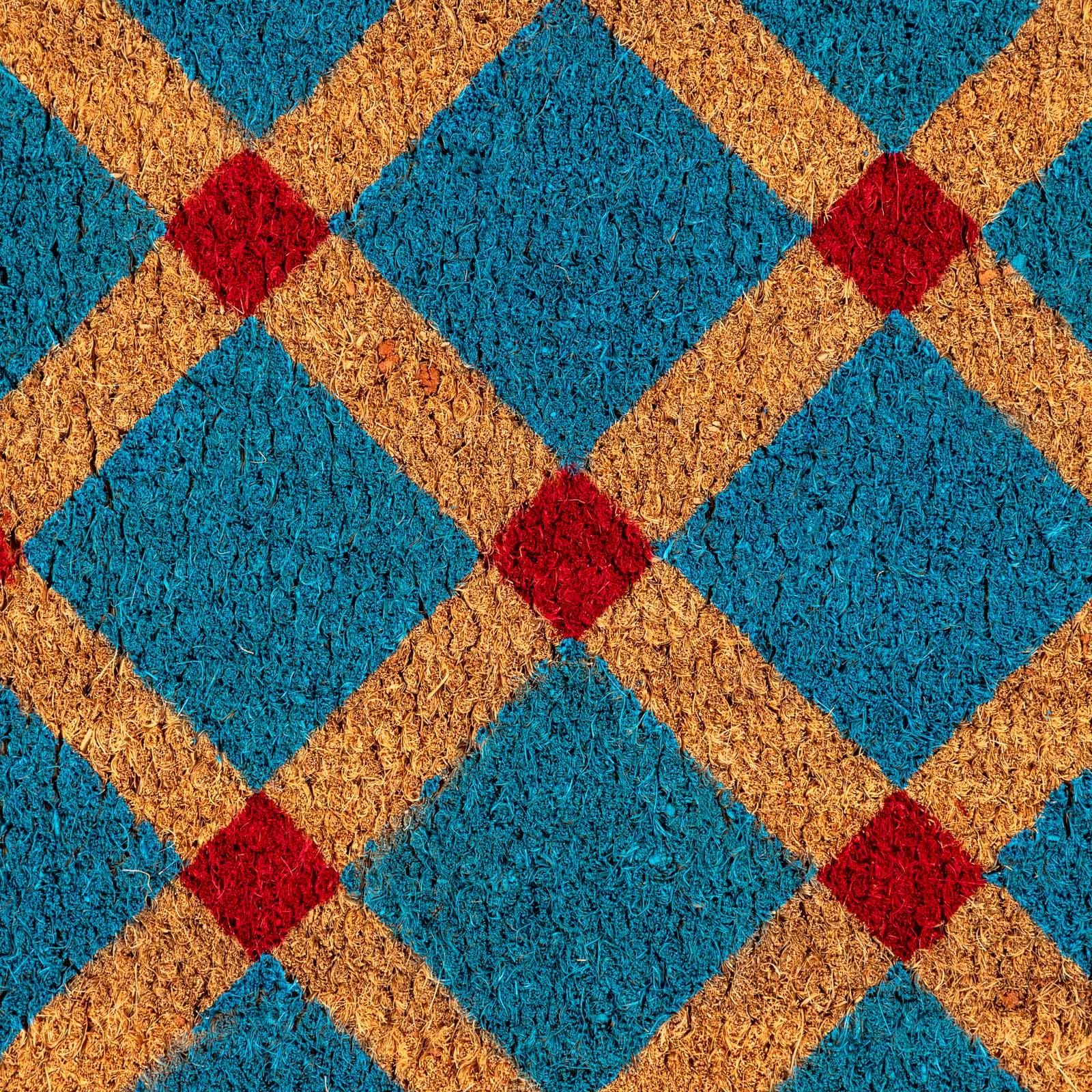 Zerbino blu petrolio 45x75 cm in coir naturale con disegno geometrico